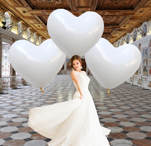 Grosse-weisse-Herzluftballons-zur-Hochzeit