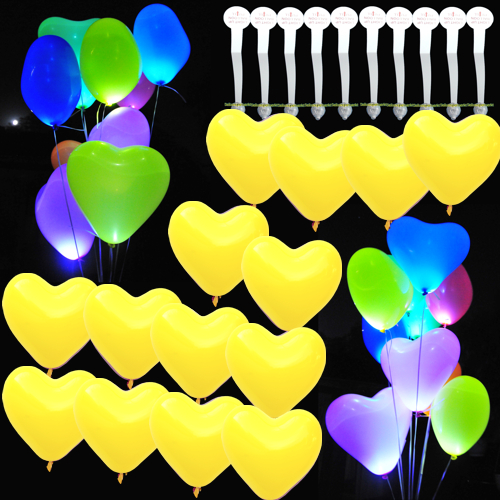 LED's und gelbe Herzluftballons