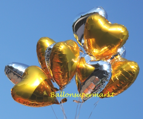Goldene Herzluftballons mit Ballongas Helium aus Folie zur Hochzeit kombiniert mit silbernen Herzballons aus Folie