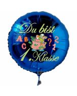 Du bist 1. Klasse. Blauer Luftballon mit Ballongas Helium gefüllt zur Einschulung, zum Schulanfang