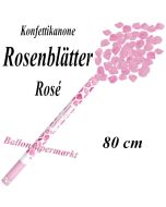 Konfettikanone mit rosafarbene Rosenblättern, Rosenrengen