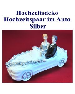 dekoration-hochzeit-hochzeitspaar-im-auto-silber